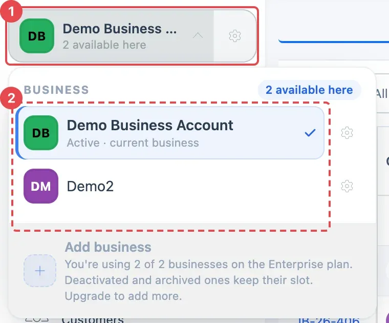 The business switcher at the top of the left menu (1), open with two businesses and a tick next to the current one (2)