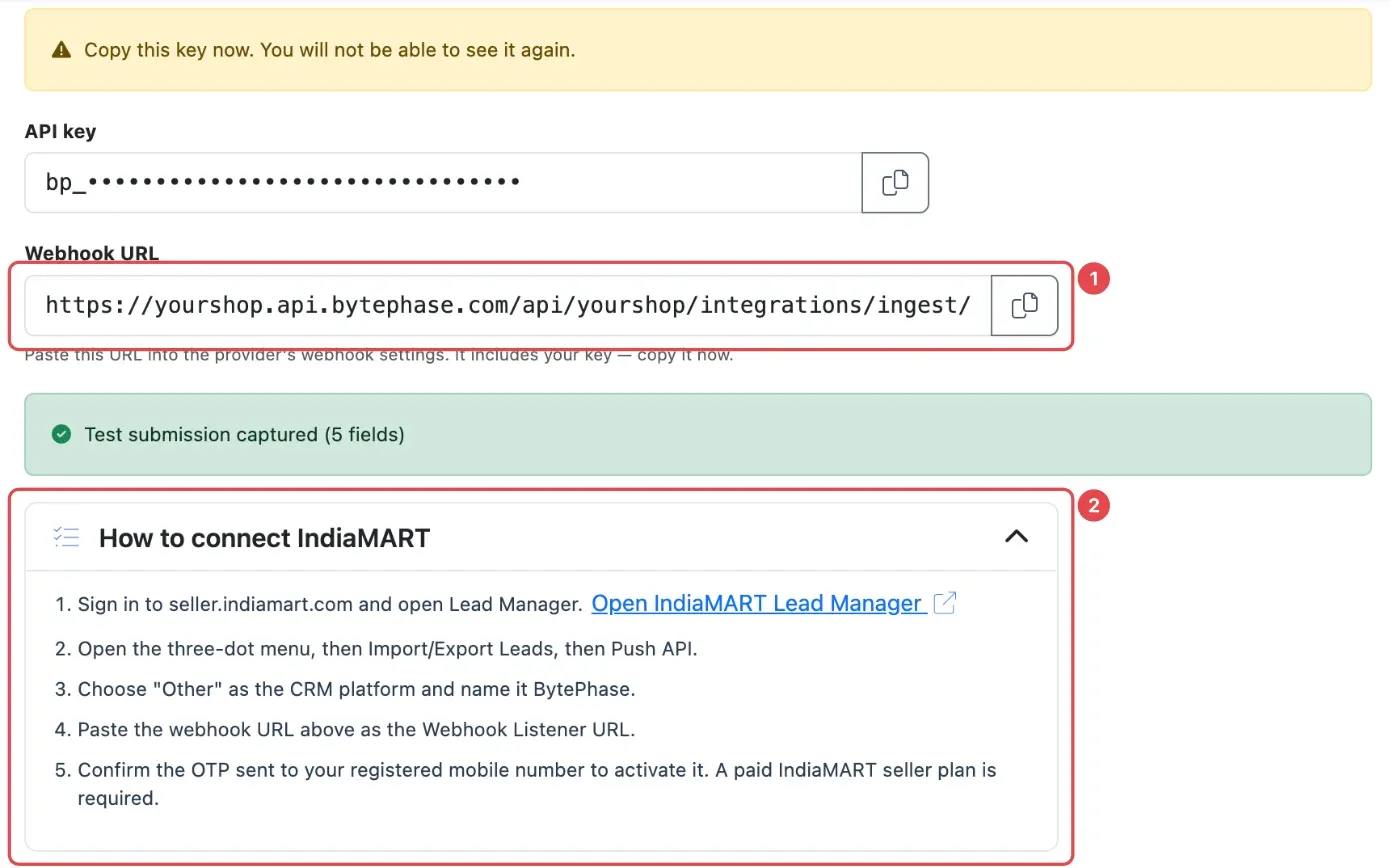 The Connect step for IndiaMART with the Webhook URL (1) and the How to connect steps (2)